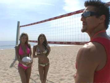 Lifeguard flirting with two girls in bikini
